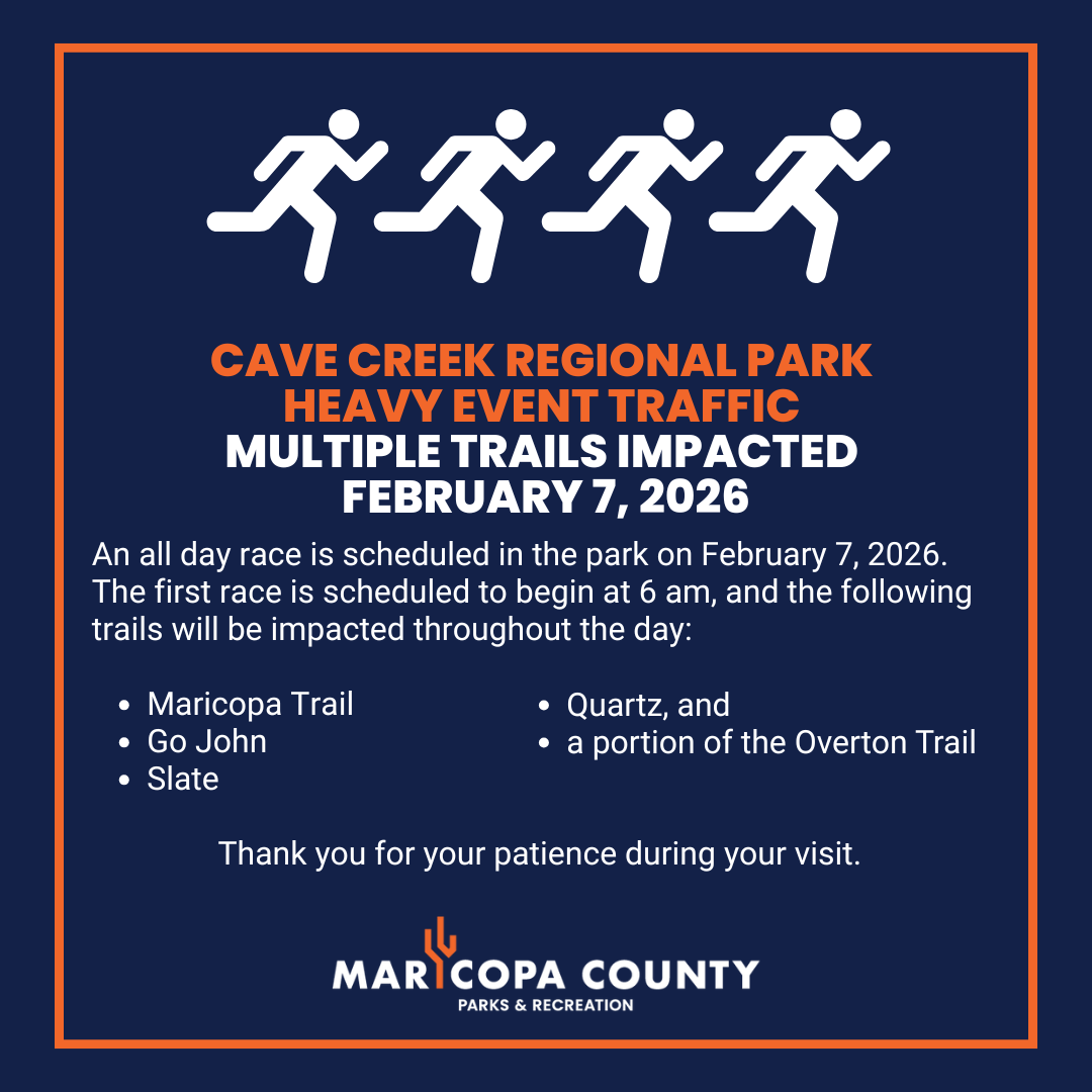 Heavy traffic event notice that features four white icons of people running. 